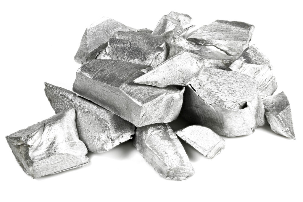 Chunks of aluminum against a white background in El Paso.